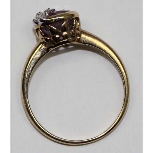 2105 - A retro style 9ct gold light purple stone and diamond ring, full English hallmarks, approx size T, a... 