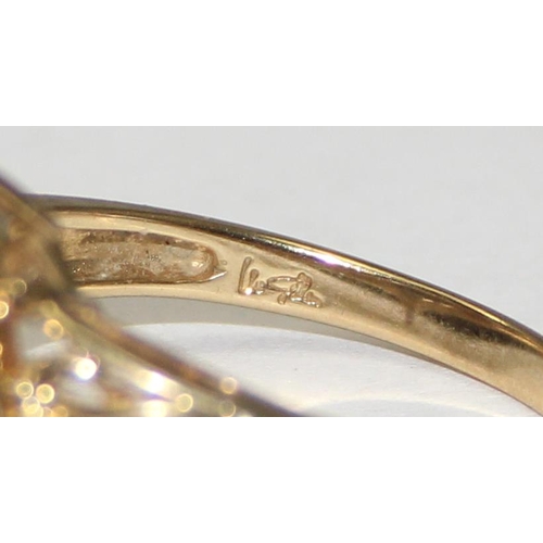 2115 - A 9ct gold Celtic Art Nouveau style ring comprising of a large white cut stone with decorative pierc... 