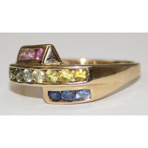 2118 - A 9ct gold retro style multi-coloured stone cocktail ring in crossover setting, full English hallmar... 