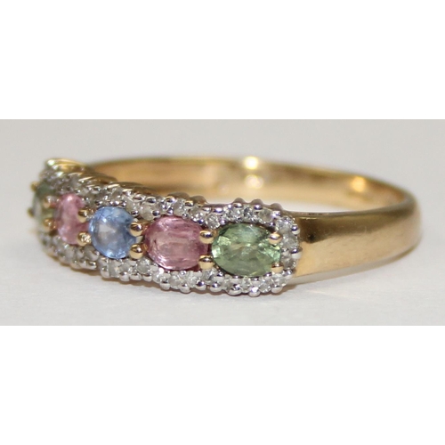 2119 - A 9ct gold retro style multi-coloured stone cocktail ring, the main stone likely coloured topaz or c... 