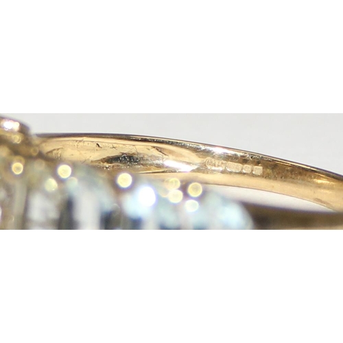 2121 - A 9ct gold retro style dress ring set with 7 white stones, full English hallmarks, approx size U, ap... 