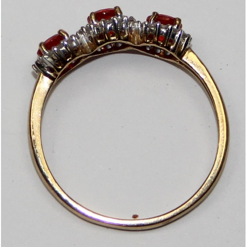 2131 - A 9ct gold 3 stone ring set with small diamonds, full English hallmarks, approx size T, approx 2.31g... 