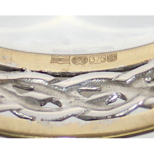 2132 - A 9ct white and yellow gold Celtic style band ring, full English hallmarks, approx size Y, approx 3.... 