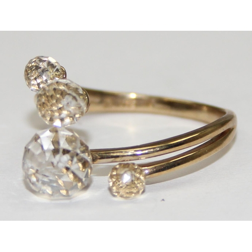 2139 - An unusual 9ct gold ring with 4 facet cut white crystal orbs, full English hallmarks, approx size W ... 