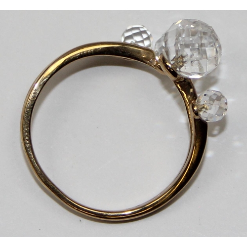 2139 - An unusual 9ct gold ring with 4 facet cut white crystal orbs, full English hallmarks, approx size W ... 