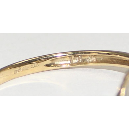 2140 - An unusual 9ct gold ring with a facet cut white crystal orb in claw setting, full English hallmarks,... 