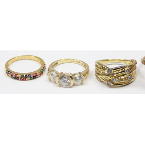 2145 - 7 assorted 925 silver gilt rings, various designs and stones, sizes ranging from S-V inclusive