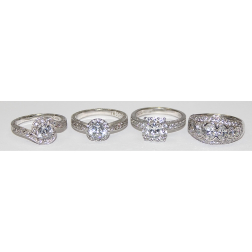 2150 - 4 assorted 925 silver dress rings, various designs but mainly with large white stones, all approx si... 