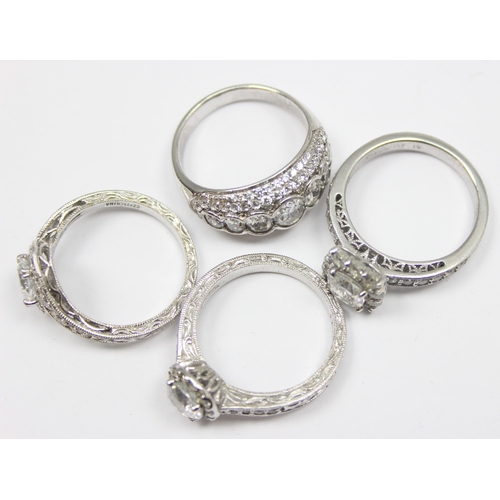 2150 - 4 assorted 925 silver dress rings, various designs but mainly with large white stones, all approx si... 