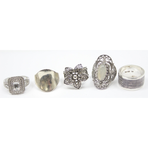 2171 - 5 assorted 925 silver dress rings, mainly white stones in various designs, all approx size T