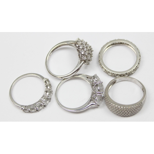 2173 - 5 assorted 925 silver dress rings, mainly white stones in various designs, all approx size T