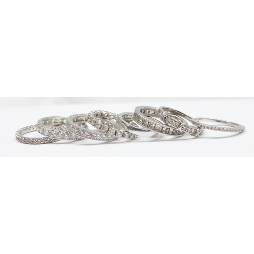 2186 - 8 assorted 925 silver dress rings, mainly eternity rings with white stones, all approx size U