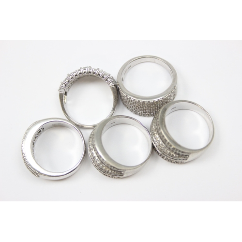 2190 - 5 assorted 925 silver dress rings, mainly with white stones in various designs, all approx size U