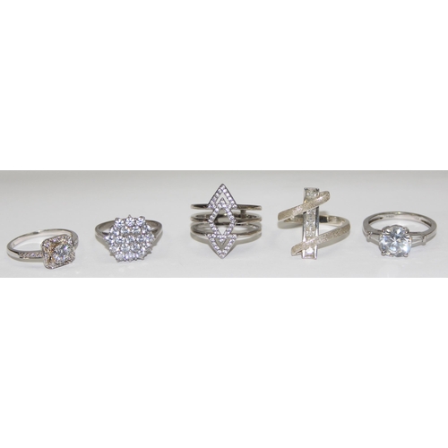 2191 - 5 assorted 925 silver dress rings, mainly with white stones in various designs, all approx size U