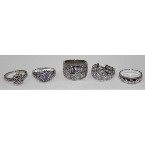 2192 - 5 assorted 925 silver dress rings, mainly with white stones in various designs, all approx size U