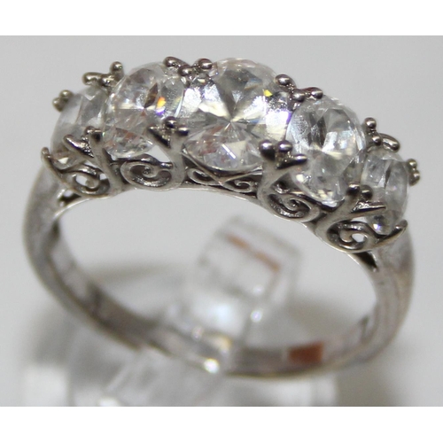 2194 - 5 assorted 925 silver dress rings, mainly with white stones in various designs, all approx size U