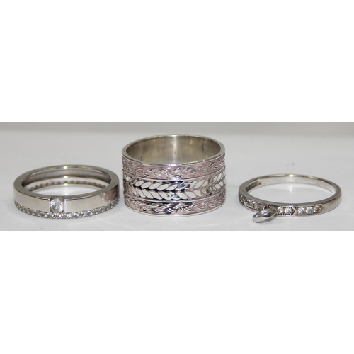 2205 - 5 assorted 925 silver dress rings, mainly with white stones in various designs, all approx size V