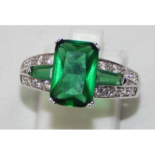 2212 - 4 assorted 925 silver dress rings, mainly with green and white stones in various designs, mixed size... 