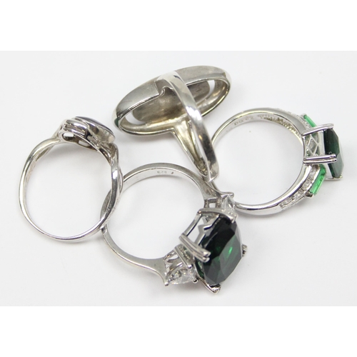 2212 - 4 assorted 925 silver dress rings, mainly with green and white stones in various designs, mixed size... 