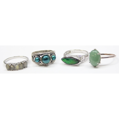 2213 - 4 assorted 925 silver dress rings, mainly with green stones in various designs, mixed sizes approx S... 