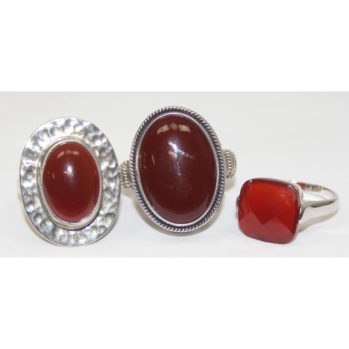 2215 - 3 assorted 925 silver dress rings, mainly with red stones in various designs, mixed sizes approx S-V