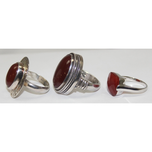 2215 - 3 assorted 925 silver dress rings, mainly with red stones in various designs, mixed sizes approx S-V