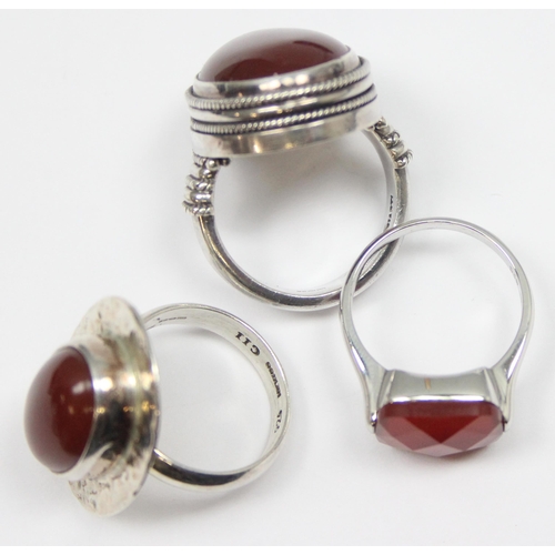 2215 - 3 assorted 925 silver dress rings, mainly with red stones in various designs, mixed sizes approx S-V