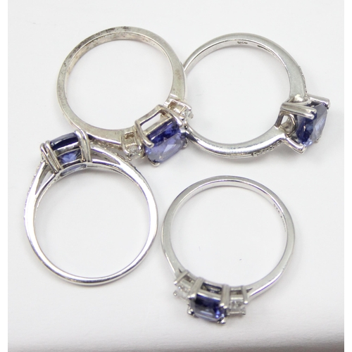 2230 - 4 assorted 925 silver dress rings, mainly with blue and white stones in various designs, mixed sizes... 