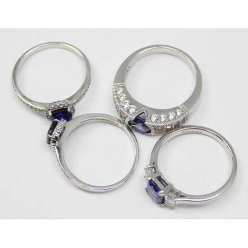 2231 - 4 assorted 925 silver dress rings, mainly with blue and white stones in various designs, mixed sizes... 