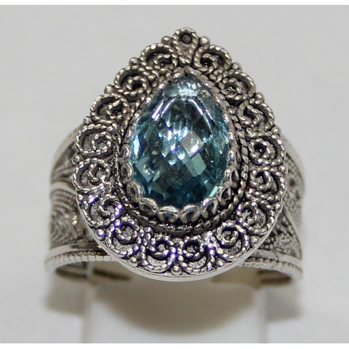 2234 - 4 assorted 925 silver dress rings, mainly with blue stones and filigree mounts in various designs, m... 