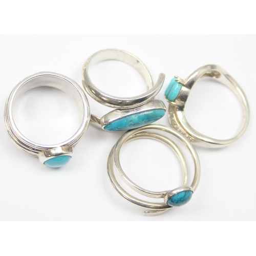 2236 - 4 assorted 925 silver dress rings, mainly with turquoise in various designs, mixed sizes approx T-X