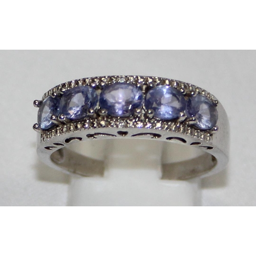 2239 - 6 assorted 925 silver dress rings, mainly with purple stones in various designs, mixed sizes approx ... 