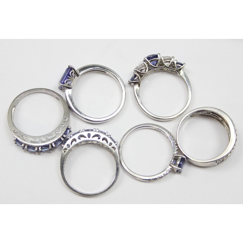 2239 - 6 assorted 925 silver dress rings, mainly with purple stones in various designs, mixed sizes approx ... 