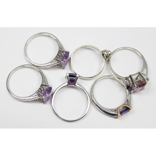 2240 - 6 assorted 925 silver dress rings, mainly with purple stones in various designs, mixed sizes approx ... 