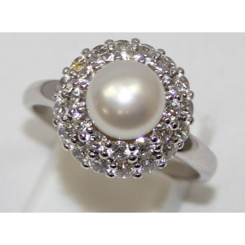 2257 - 4 assorted 925 silver dress rings, pearl and white stone mounted in various designs, mixed sizes app... 