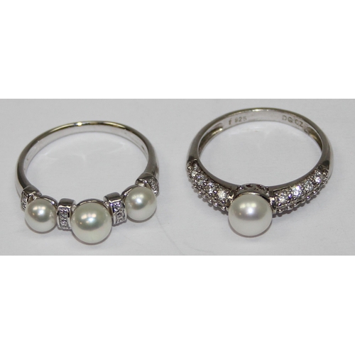 2257 - 4 assorted 925 silver dress rings, pearl and white stone mounted in various designs, mixed sizes app... 