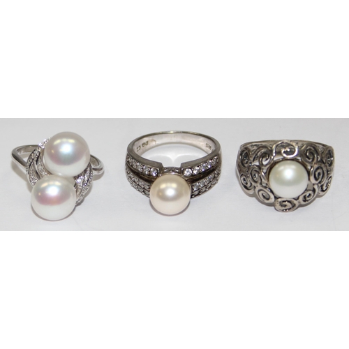 2259 - 4 assorted 925 silver dress rings, pearl mounted in various designs, mixed sizes approx T-V