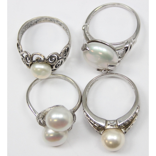 2259 - 4 assorted 925 silver dress rings, pearl mounted in various designs, mixed sizes approx T-V