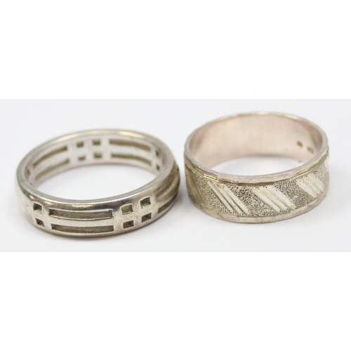 2267 - 4 assorted 925 silver band rings, in various designs, mixed sizes approx T-X