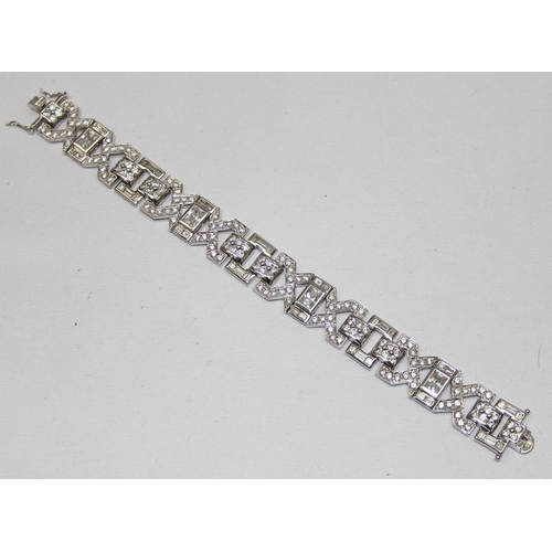 2274 - An Art Deco style 925 silver bracelet, various cuts and settings of white stones in angular setting,... 