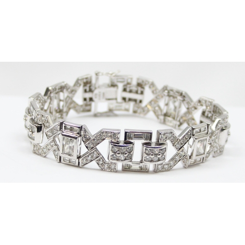 2274 - An Art Deco style 925 silver bracelet, various cuts and settings of white stones in angular setting,... 