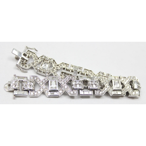 2274 - An Art Deco style 925 silver bracelet, various cuts and settings of white stones in angular setting,... 