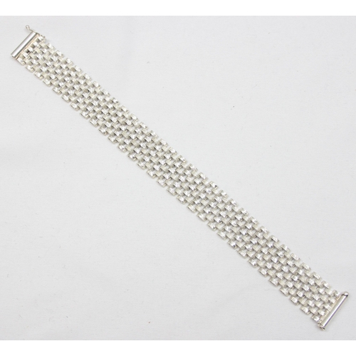 2278 - A retro style 925 silver mesh bracelet, marked 925 and XRF confirmed, approx 20cm long, approx 26.11... 