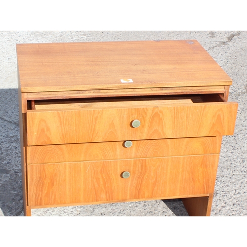 149 - A retro 3 drawer chest of drawers with unusual sliding top to reveal jewellery tray, approx 71cm wid... 