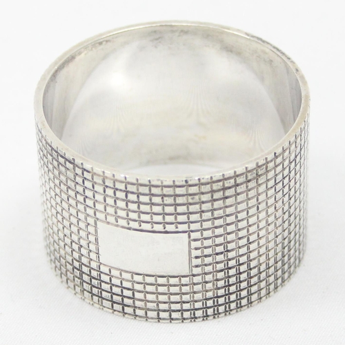 1004 - A heavy gauge silver napkin ring, London 1964 by SJ Rose & Son, in vintage box, approx 57.56g gross