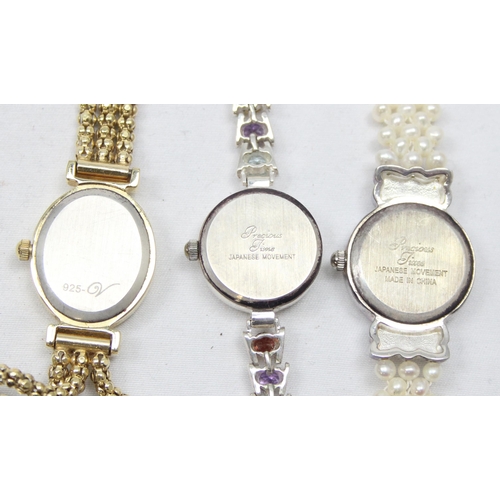 1311 - 3 ladies watches all marked 925 silver, one with faux pearl strap, one silver-gilt and one with colo... 