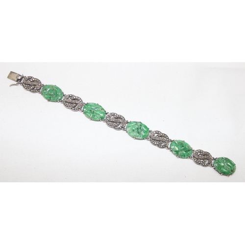 2020 - A stunning early 20th century Art Deco period silver marcasite and carved jade bracelet, seemingly u... 