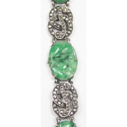 2020 - A stunning early 20th century Art Deco period silver marcasite and carved jade bracelet, seemingly u... 