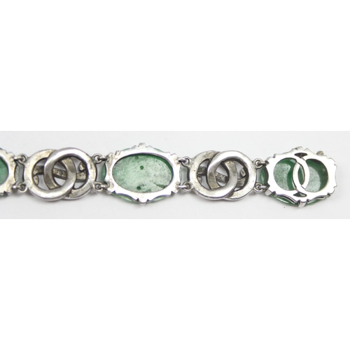 2020 - A stunning early 20th century Art Deco period silver marcasite and carved jade bracelet, seemingly u... 