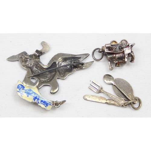 2026 - A small vintage silver brooch formed as a cartoon donkey, a silver charm formed as Tower Bridge in L... 